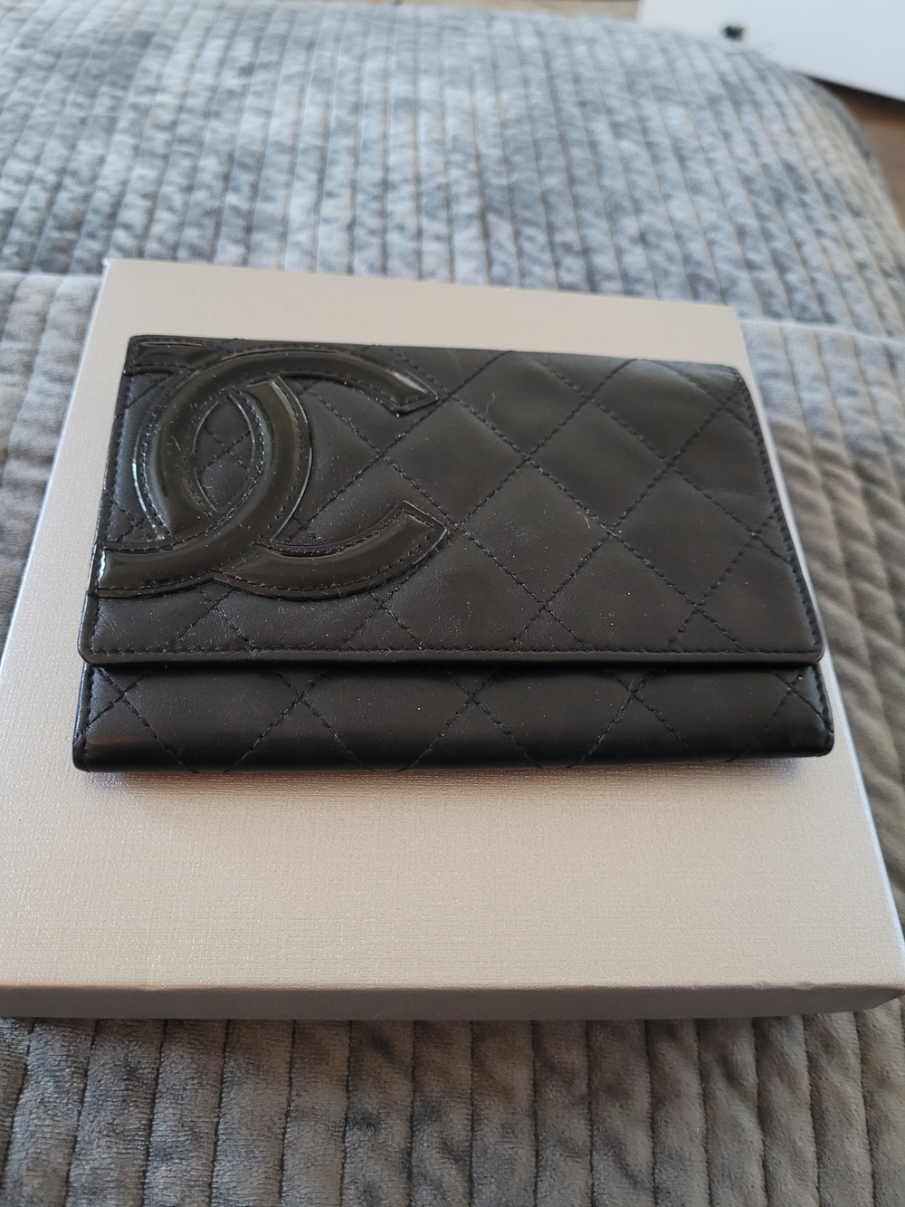 CHANEL Black Quilted Lambskin Wallet with CC Appliqué